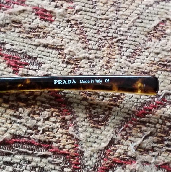 PRADA Sunglasses Model:PRADA SPR 10B Frame Color:Brushed Matte Silver Tortoise - Picture 2 of 13